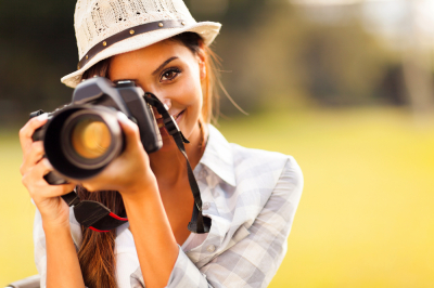 Girl Holding Camera